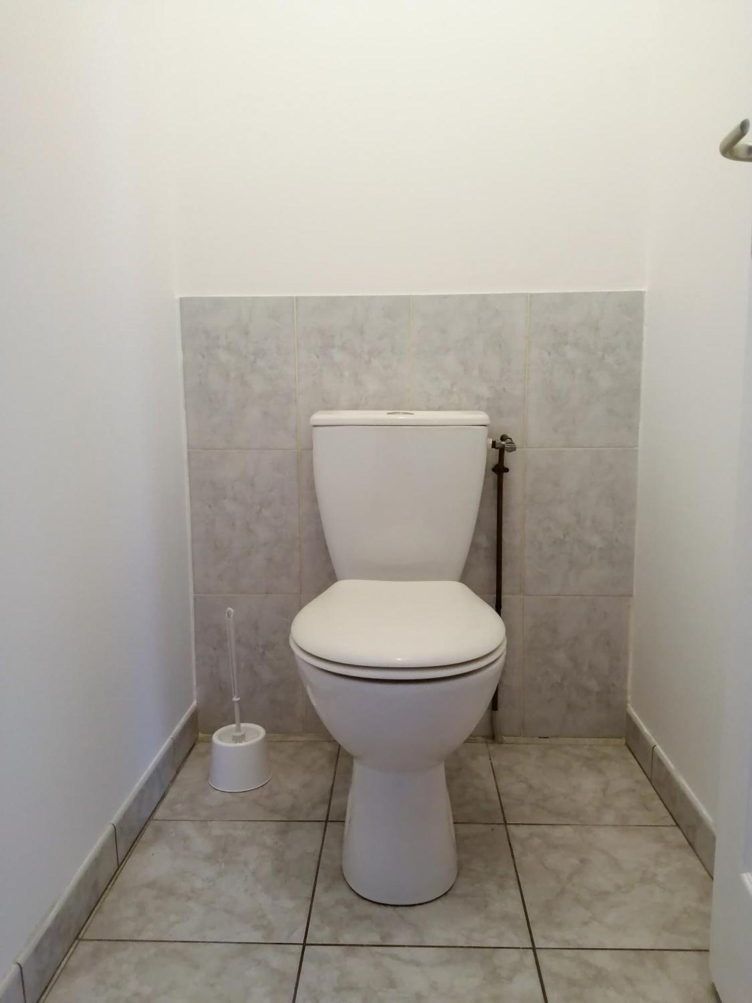 Le 32 Apartment Коняк Екстериор снимка